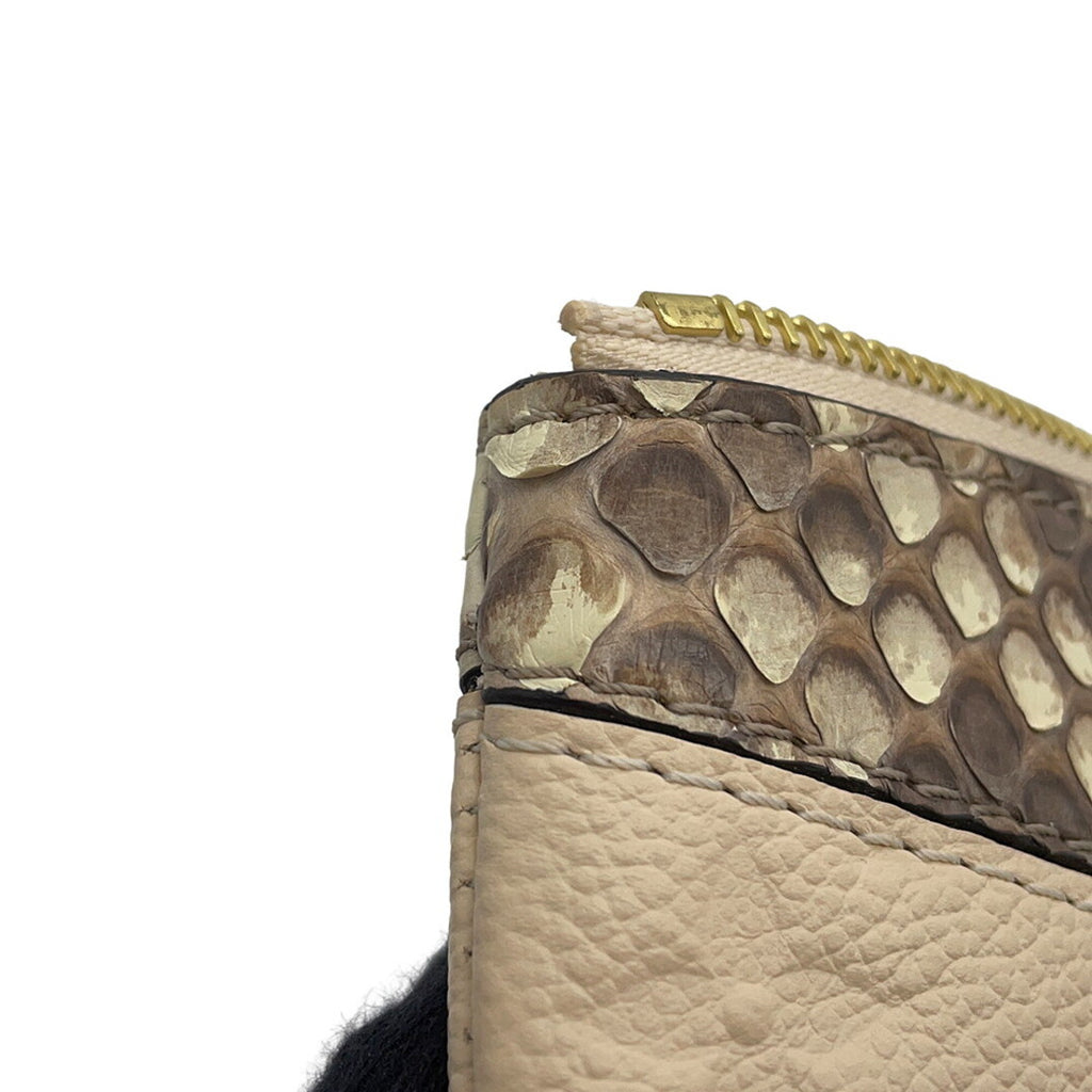 Louis Vuitton Monogram Empreinte Daily Pouch