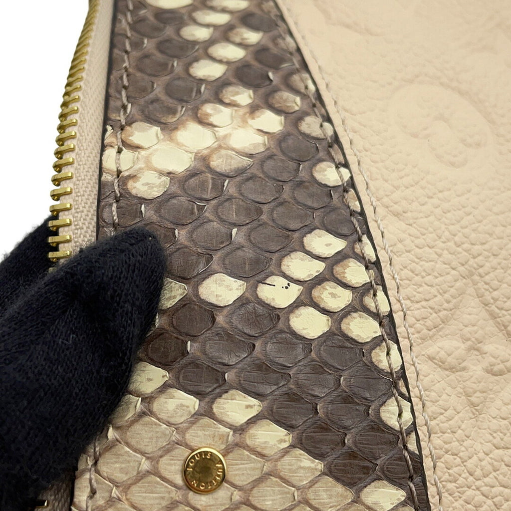 Louis Vuitton Monogram Empreinte Daily Pouch
